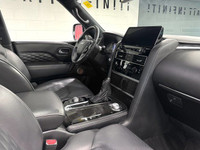 The 2024 Infiniti QX80 Luxe is a powerful and refined SUV, driven by a 5.6L premium engine that deli... (image 5)