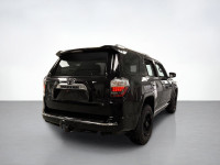 Meet our used 2014 Toyota 4Runner SR5 Limited 4WD shown in Attitude Black. This SUV is powered by a... (image 4)