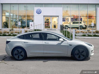 This Tesla Model 3 boasts a Electric engine powering this Automatic transmission. Window Grid Antenn... (image 5)