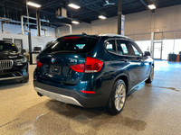 Our outstanding Blue 2015 BMW X1 xDrive35i offers fun driving dynamics great versatility and awesome... (image 4)