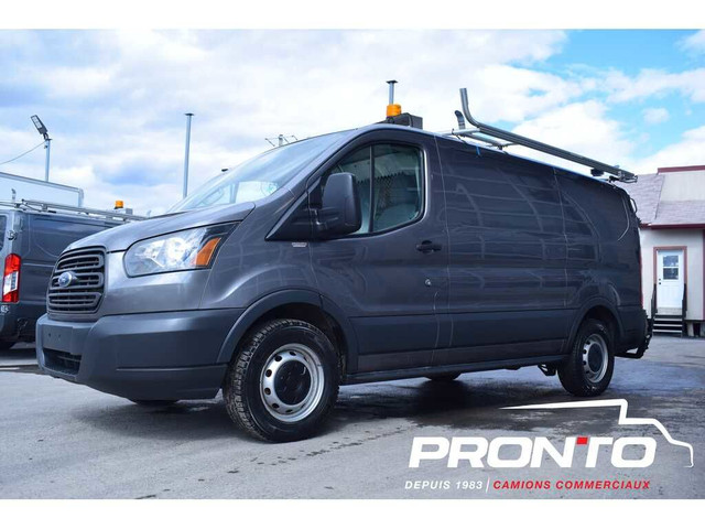  2015 Ford Transit Cargo Van T-150 130WB Low Roof ** FULL RACK * in Cars & Trucks in Laval / North Shore