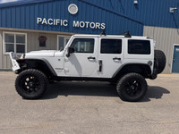 2013 Jeep Wrangler Unlimited Sahara 4x4 for sale at Pacific Motors near Winnipeg, MB DISCLAIMER: THI... (image 8)