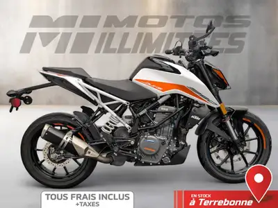 KTM 390 DUKE 2022 Blanc et Noir 8590 km au compteur. Motos Illimitées Terrebonne. Prix de vente incl...