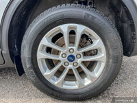 This Ford Escape delivers a Intercooled Turbo Premium Unleaded I-3 1.5 L/91 engine powering this Aut... (image 7)