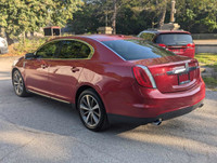 Looking for a stylish and comfortable sedan that won't break the bank? Look no further than this 200... (image 2)