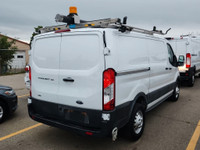This is a low roof, T-150 All Wheel Drive unit with shelving and roof rack. Fully loaded, back up ca... (image 3)