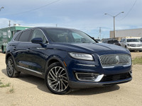 Under the glistening Rhapsody Blue exterior, the 2019 Lincoln Nautilus Reserve stands as a testament... (image 9)