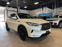 Drive our 2022 INFINITI QX50 SENSORY AWD and dare to defy the status quo in White! Powered by a Turb... (image 6)