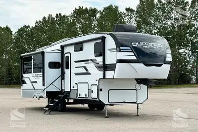 Introducing the 2024 K-Z Durango Half-Ton 283RLT, a modern couple's trailer with a dry weight just u...