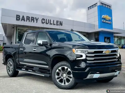 Experience the power and luxury of the brand-new black 2023 Chevrolet Silverado 1500 High Country. T...