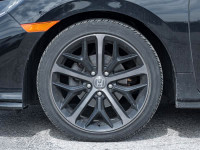 Experience the epitome of elegance and performance with the 2021 Honda Civic Hatchback Sport. Finish... (image 3)