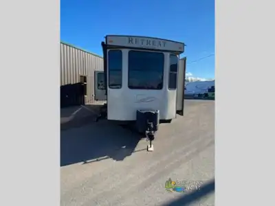 This park model weighs 11876lbs and features 3 slides, front king bedroom with brand new mattress an...