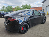 Unleash instant torque and futuristic performance with this 2023 Tesla Model Y Performance—solid bla... (image 5)