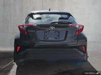 Make a bold statement on Ottawa's streets with this eye-catching 2022 Toyota C-HR, a compact crossov... (image 2)