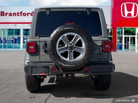 Conquer any terrain with this 2021 Jeep Wrangler Unlimited Sahara, boasting a powerful 3.6L Pentasta... (image 4)
