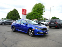 This Aegean Blue Metallic 2021 Honda Civic LX Sedan boasts a sleek profile and impressive fuel effic... (image 2)
