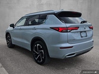 This Outlander features heated rear seats, a panoramic sun/moonroof, and a 3rd row seat. Advanced sa... (image 1)