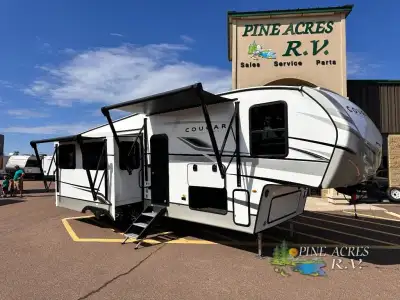 Keystone Cougar Half-Ton fifth wheel 29RLISE highlights: Kitchen Island 8740 Lbs Dry Weight Opposing...