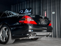 Presenting the 2005 Mercedes-Benz SL55 AMG sold by St Albert Exotics Panoramic vario-roof AMG-PERFOR... (image 5)