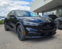 This brand new SHADOW BLACK 2024 MUSTANG MACH-E SELECT is powered by an ELECTRIC ENGINE THAT'S PAIRE... (image 1)