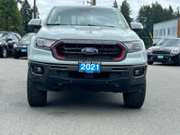 This 2021 Ford Ranger Lariat has a Cactus Grey Exterior and Ebony Leather Interior with seating for... (image 9)
