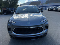 Expressive and energetic, our 2026 Buick Encore GX Sport Touring AWD in Moonstone Gray Metallic stan... (image 1)