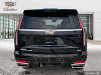 The 2022 Cadillac Escalade highlights include adaptive cruise control, panoramic roof, 3rd-row seati... (image 3)