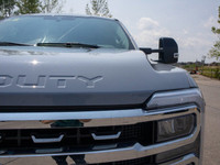 The 2024 Ford Super Duty F-250 SRW LARIAT combines heavy-duty performance with upscale comfort---bui... (image 9)