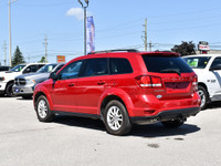The 2014 Dodge Journey FWD SXT is the perfect combination of style, convenience, and performance. It... (image 4)