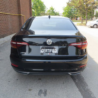 This 2019 Volkswagen Jetta is a stylish sedan with a sleek black exterior and dual tone black and pe... (image 6)