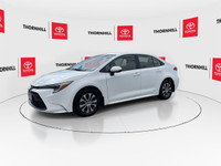 This, is a White 2024 Toyota Corolla Hybrid with LE AWD Package, Featuring:~ Complete Service Histor... (image 4)