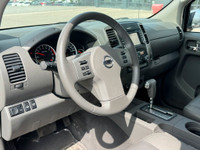 The 2019 Nissan Frontier SL offers a premium blend of rugged capability and refined comfort. Powered... (image 5)