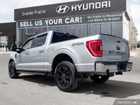 This 2023 Ford F-150 XL Crew Cab pickup boasts a powerful 3.5L V6 EcoBoost engine, ready to tackle a... (image 3)