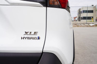 Check out this stylish and fuel-efficient 2020 Toyota RAV4 Hybrid XLE! With its sleek white exterior... (image 9)