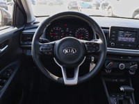 Experience efficiency, agility, and modern convenience with the 2020 Kia Rio LX+ in sleek Aurora Bla... (image 9)