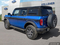 Unleash the thrill of open-air adventure with this stunning 2022 Ford Bronco convertible. Its powerf... (image 2)