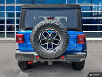 This Jeep Wrangler has a trusty Regular Unleaded V-6 3.6 L/220 engine powering this Manual transmiss... (image 3)