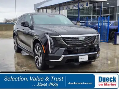 Our luxurious 2025 Cadillac Escalade IQ Luxury 1 AWD in Black Raven plugs in and is ready for you! P...