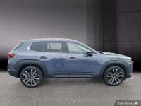 Le Mazda CX-50 GT Turbo 2024 est un VUS compact qui allie performance dynamique et raffinement. Équi... (image 7)