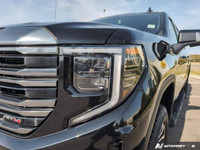 The pre-owned *2022 GMC Sierra 1500 AT4* is a rugged and refined pickup designed for drivers who nee... (image 8)