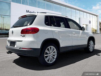 This Volkswagen Tiguan boasts a Intercooled Turbo Premium Unleaded I-4 2.0 L/121 engine powering thi... (image 4)