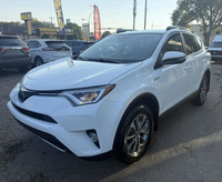 **CARS TRUCKS SUV 4X4 VAN AWD EDMONTON FINANCING AVAILABLE EASY FINANCING ** 2018 Toyota RAV4 Hybrid... (image 1)