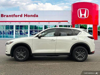 Experience the smooth handling and confident all-wheel drive of this 2021 Mazda CX-5 CX5TRXA. With o... (image 1)