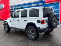 This Jeep Wrangler has a trusty Regular Unleaded V-6 3.6 L/220 engine powering this Automatic transm... (image 3)