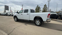 This Ram 2500 is equipped with: Cloth Front 40/20/40 Bench Seat, Radio: Uconnect 5 Nav w/8.4 Display... (image 5)