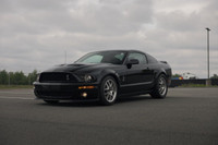 Equipped with a 500 hp supercharged 5.4L V8, 6-speed manual, and Brembo brakes for raw muscle. Deale... (image 4)