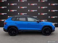 The 2024 Volkswagen Taos Comfortline Black Edition AWD blends turbocharged performance with bold bla... (image 6)