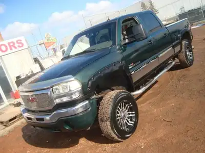 NORTH POINT MOTORS...CALL TEXT 780-224-7791 CHECK OUT THIS 03 GMC 2500HD 4X4 6.6L DURAMAX DIESEL. TR...