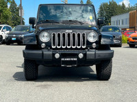 This 2018 Jeep Wrangler Sahara has a Black Exterior and Black Interior with seating for 5. Equipped... (image 9)