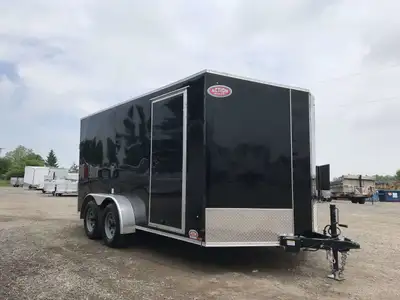 ACTION ECONO SERIES 7' X 14' TANDEM AXLE CARGO TRAILER WITH REAR RAMP DOOR! Experience practicality...